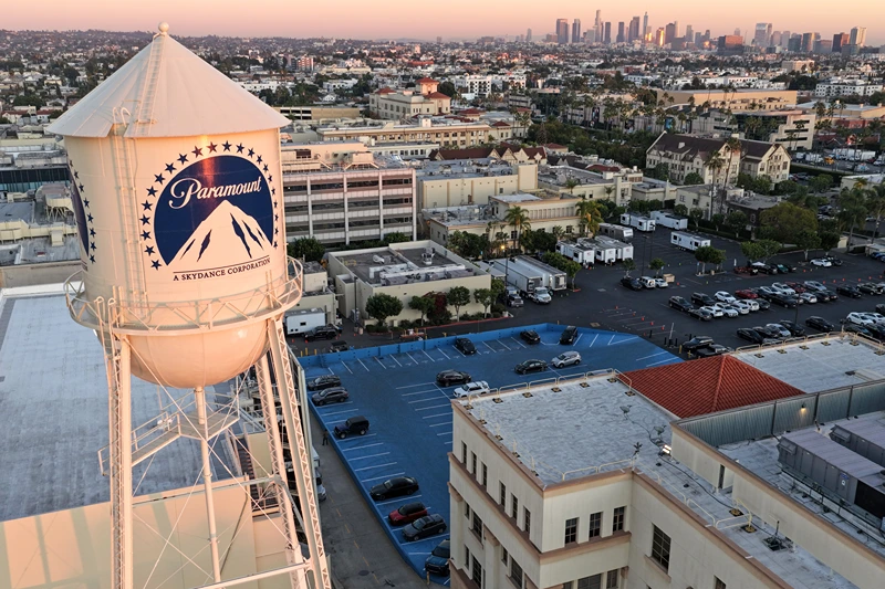 An aerial view shows the Paramount logo displayed on the water tower at Paramount Studios on December 8, 2025 in Los Angeles, California. (Photo by Mario Tama/Getty Images)