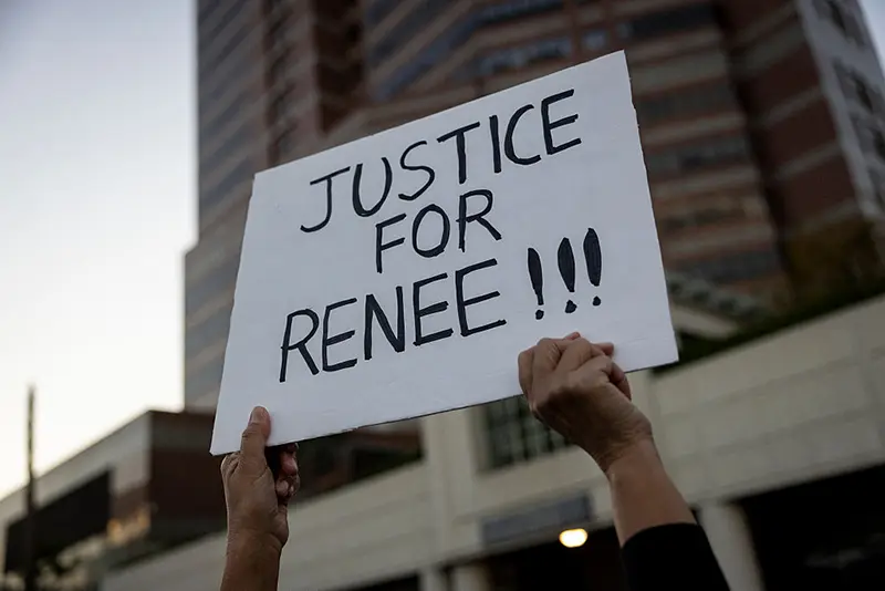 A person holds up a sign during a protest in Los Angeles, California on January 10, 2026 against US Immigration and Customs Enforcement (ICE) after the fatal shooting of Renee Nicole Good in Minneapolis. A US Immigration and Customs Enforcement (ICE) agent shot and killed 37-year-old Renee Nicole Good on the streets of Minneapolis on January 7, leading to huge protests and outrage from local leaders who rejected White House claims she was a domestic terrorist. (Photo by ETIENNE LAURENT / AFP via Getty Images)