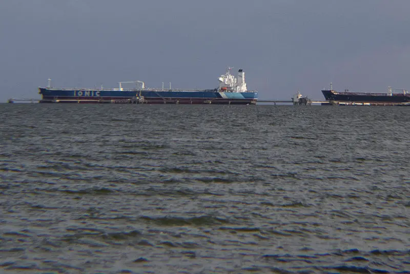 Crude oil tankers are pictured at Maracaibo Lake in Maracaibo, Venezuela on January 12, 2026. After the US raid that deposed Nicolas Maduro as Venezuela's leader, citizens hope the ensuing talks on selling its oil to US may improve their dire economic fortunes. (Photo by Margioni BERMÚDEZ / AFP via Getty Images)