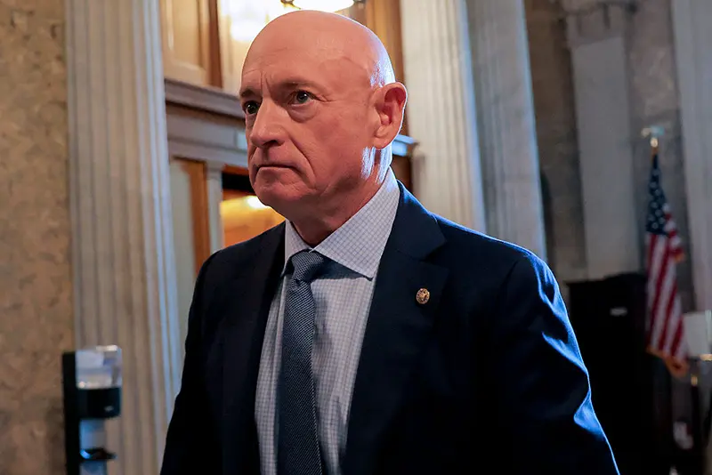 Senator Mark Kelly (D-AZ) leaves the Senate floor after speaking on January 12, 2026 in Washington, DC. Kelly spoke about the lawsuit he filed against United States Secretary of War Pete Hegseth's attempt to censure and demote him. (Photo by Heather Diehl/Getty Images)